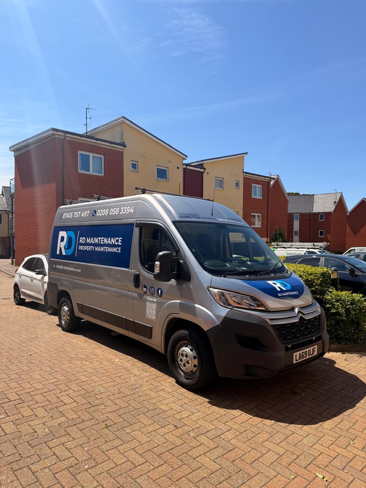 RD Maintenance van outside a residential block
