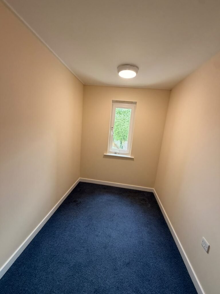 Freshly painted room with new carpet