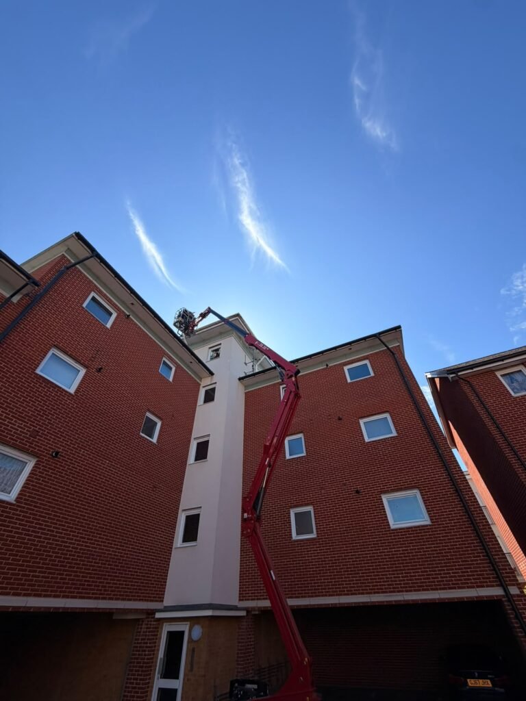 Cherry picker in use at a residential block