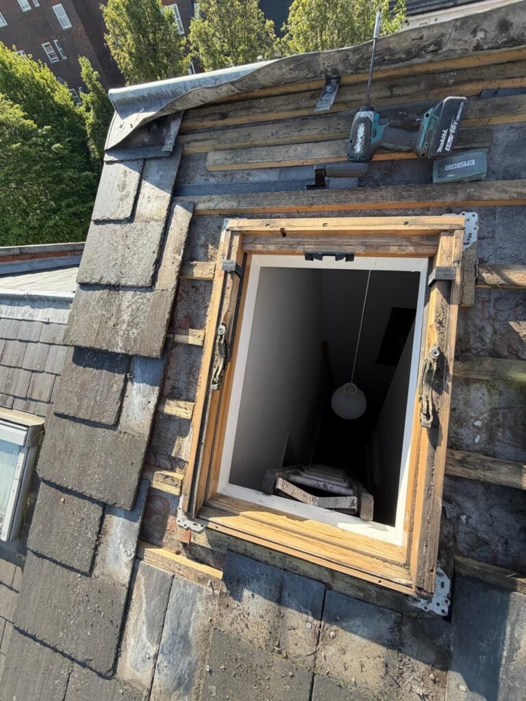 Opening in slate roof during roof window replacement