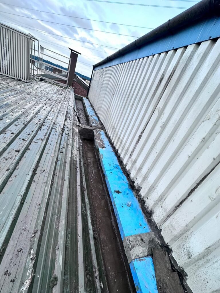 Commercial roof gutter after clearance
