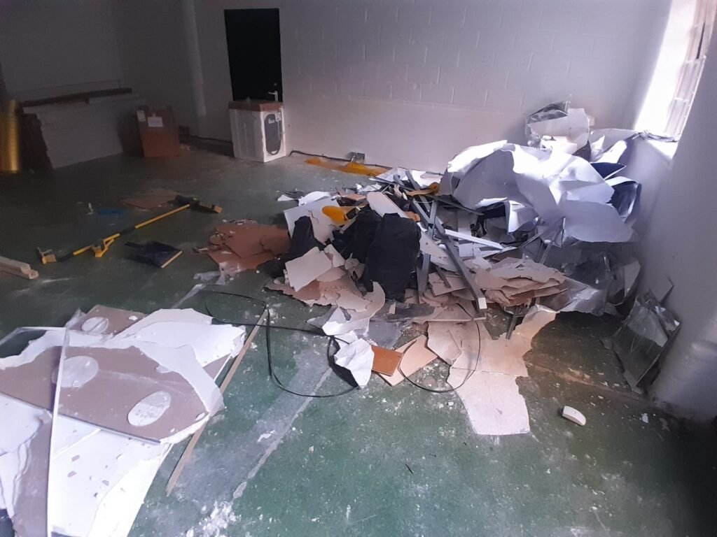 Room full of rubbish before clearance