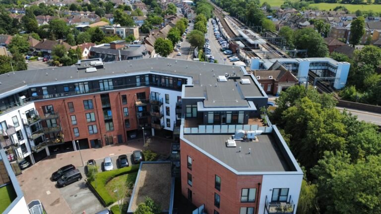 Aerial view of flat roofs on a residential block – RD Maintenance roofing